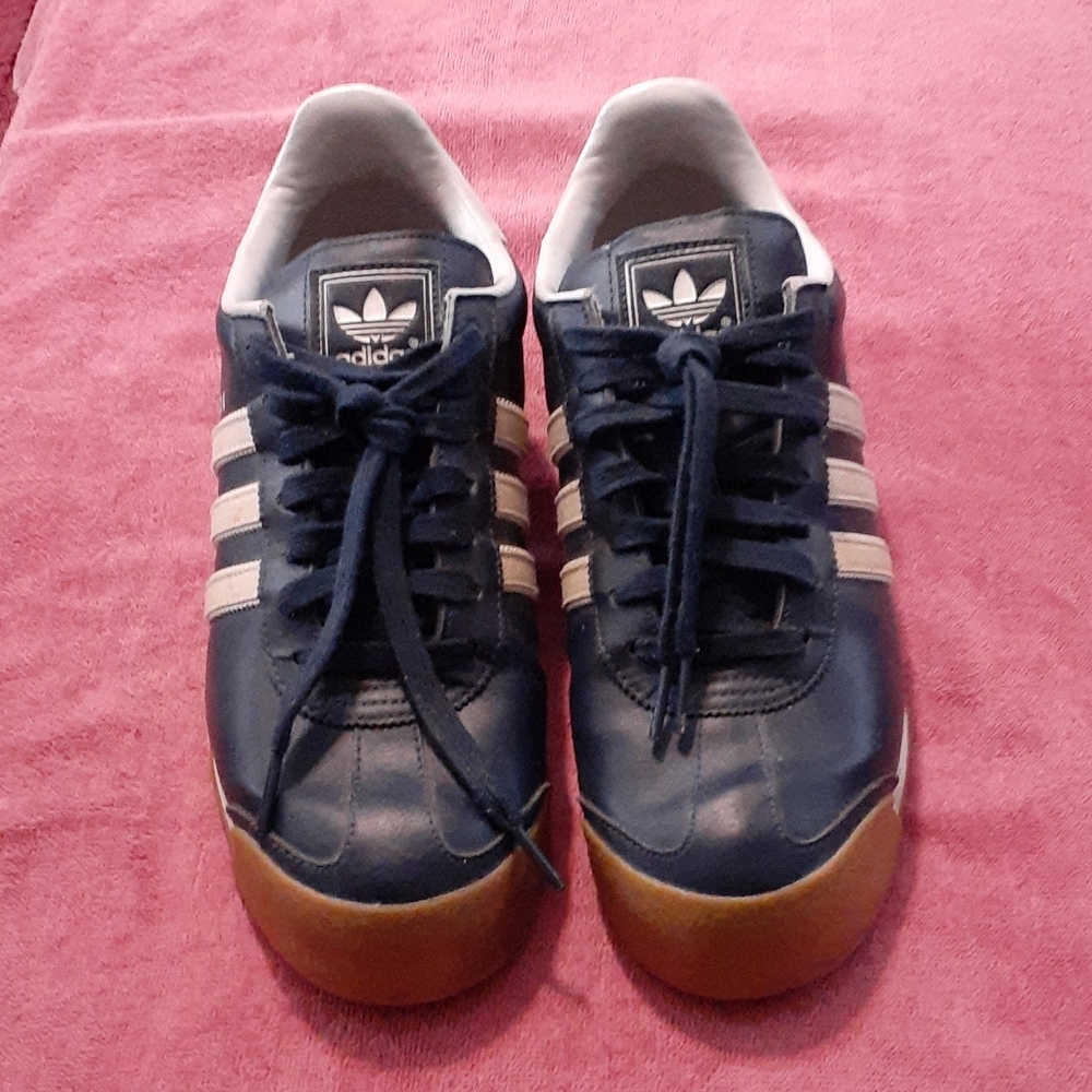 Male Adidas sneakers.